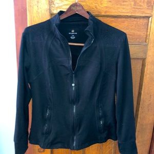 Zip up athletic jacket with cut out designs